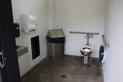 Interior of accessible restroom near parking and the shelter with benches – near sports fields